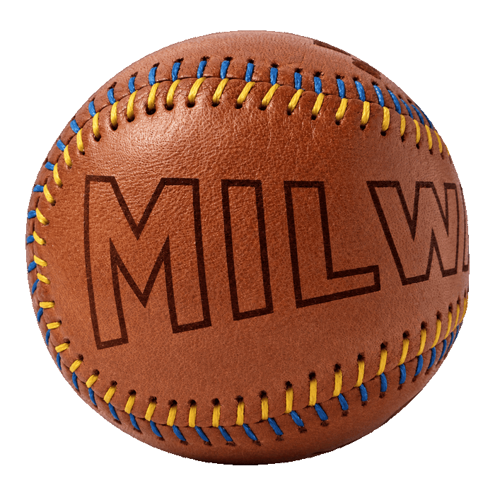 Milwaukee Yardball with blue and gold stitching, MILWAUKEE engraved across the leather, World Champions on top and 2026 below